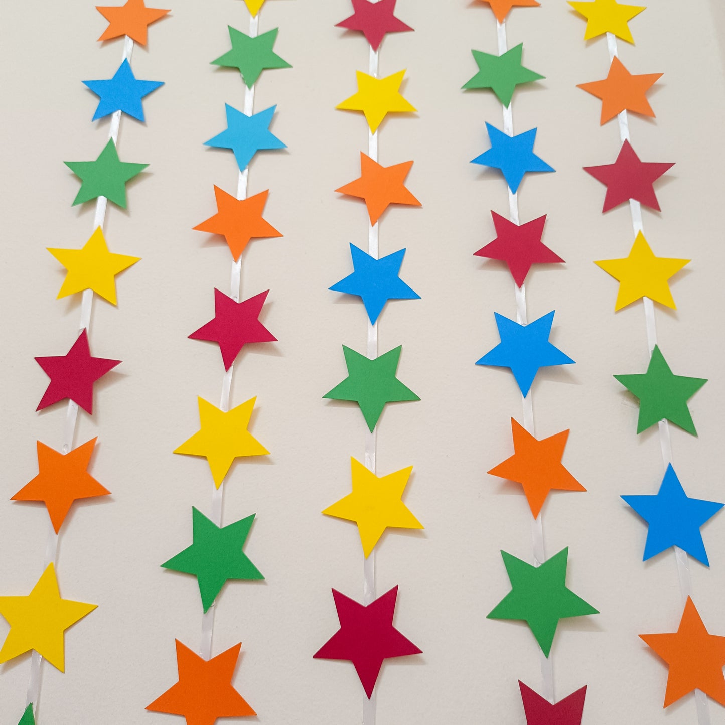 MULTI COLOR STAR SHAPED STRING BANNER BACKDROP - 5 STRINGS IN A PACK